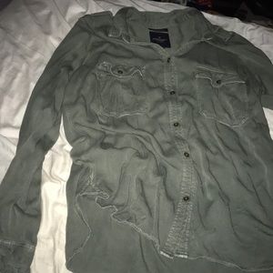 Green button up shirt